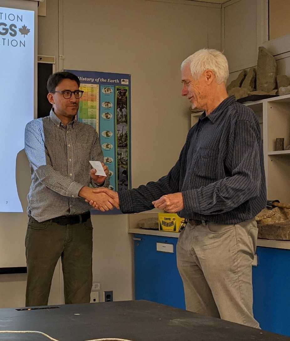 Scholarship presentation by Prof. Richard Smith, Dir., to Laurentian Ph.D candidate Christopher Mancuso