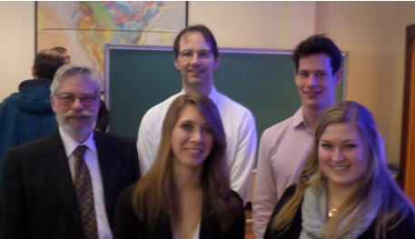 (Back L to R): Bill Scott, KEGS SL speaker and Dr. Alexander Braun with Queen's scholarship recipients Benjamin Ewasko and (Front centre and R) Danielle Beaulne and Katie Irwin.